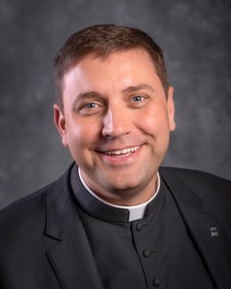 Monsignor James P Shea